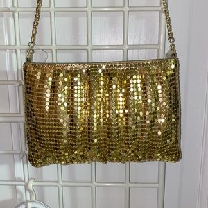 Gold evening bag with gold chain. New